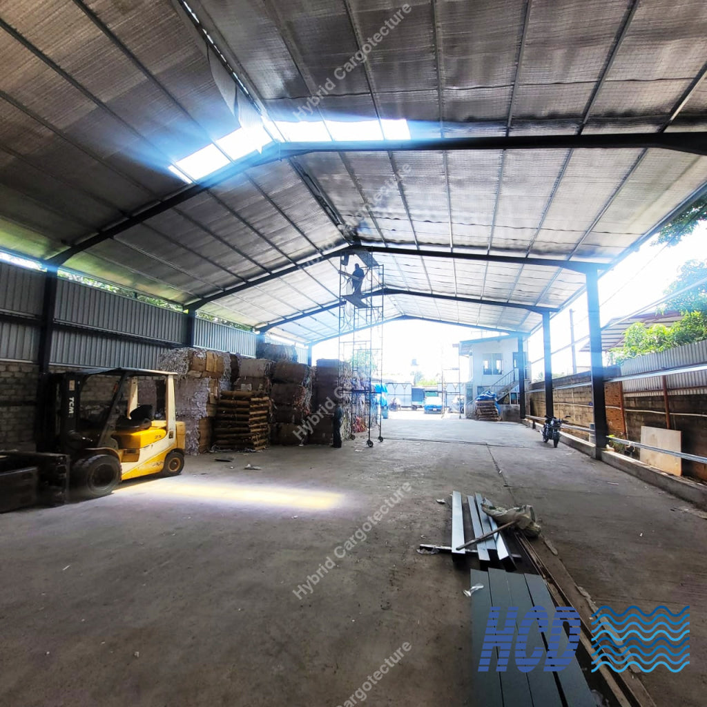 Open storage space and roof structure inside the HCD Wattala warehouse