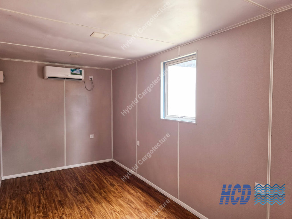 Finished HCD office container interior with flooring and air conditioning