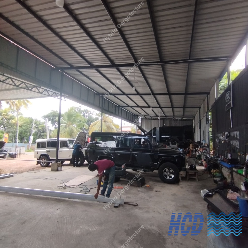 Interior of HCD vehicle workshop in Thalawathugoda beneath its steel roof